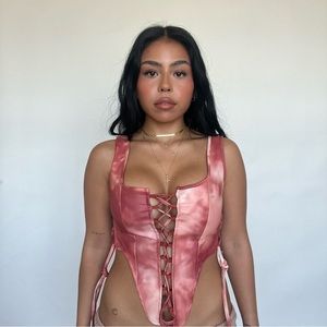 Pink faux leather lace up corset top